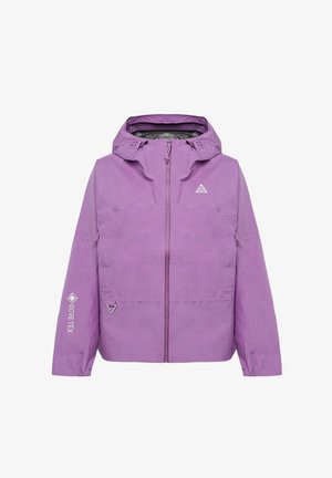 Purple waterproof jacket made with GORE-TEX. Features a hood, front zip, and unique cut. Largely smooth texture with adjustable elements.