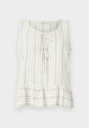 Blouse en lin sans manches blanche avec de fines rayures verticales marron. Dotée d'un col rond, d'un lien à l'avant et d'un détail en bas de taille évasée.