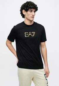 EA7 Emporio Armani TRAIN LOGO SERIES - Tepláky - fog