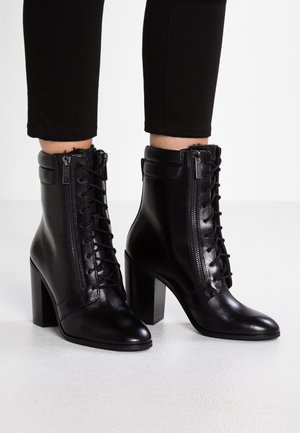 Bottines à talons hauts - black