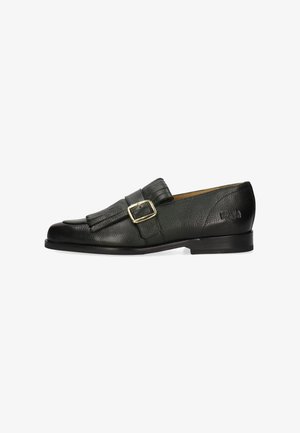 Schwarzer Lederloafer mit goldener Schnallriemen und Fransendetail, niedriger Absatz und strukturierter Oberfläche.
