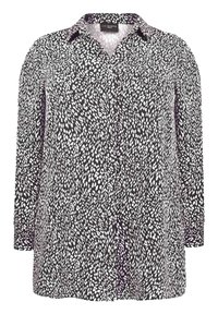 Schwarzes Langarmshirt mit weißem abstraktem Druck, mit durchgehender Knopfleiste, Kragen und lockerer Passform. Hergestellt aus leichtem Stoff.