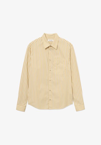 Keltainen raidallinen pitkähihainen paita, valmistettu kankaasta; siinä on kaulus, napitettava edestä, vasemman rinnan tasku ja hihansuut.