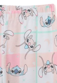Katoenen pyjamashorts met een pastelkleurig geruit patroon met cartoonfiguren, voornamelijk in roze, muntgroen en wit. Elastische tailleband.