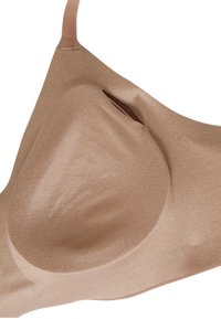 Lys bronze sømløs bh med glat stof, formede skåle og justerbare stropper med en integreret lommeåbning til puder.
