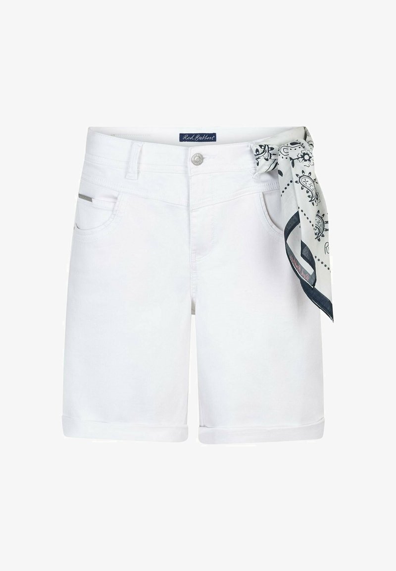 White knee-length shorts with cuffed hems and a black-and-white patterned scarf tied at the right belt loop.