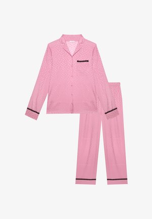 Rosa Pyjama-Set mit langen Ärmeln und Knöpfen, dezentem Herzmuster und schwarzen Spitzenbesätzen an den Bündchen, der Brusttasche und den Hosenabschlüssen.