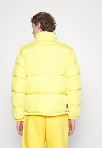 Tommy Jeans ALASKA  - Piumino - warm yellow