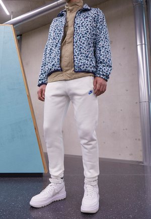 Nike Sportswear Pantalones deportivos - off-white