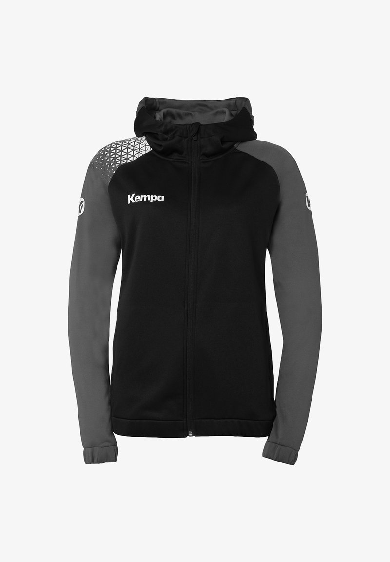 Zwarte en grijze hoodie met rits en capuchon. Heeft een geometrisch patroon op de linkerschouder en het Kempa-logo op de borst. Zachte stof.