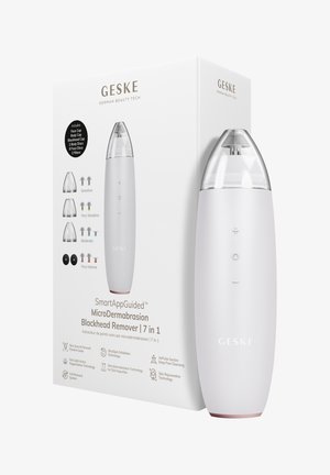 Geske microdermabrasion blackhead remover device with clear cap, plus box showing product name, features, and included accessories.