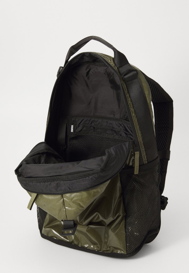rains olive backpack Mini Trail Clip Front Backpack is designed for an active lifestyle packed with functional details in a spacious main compartment MSN Bag Rains Olive