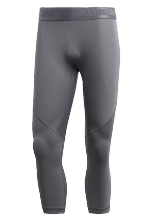 Gray Adidas compression leggings with stitched panels and branded elastic waistband, cropped length ending below the calf.