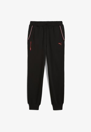 Czarne sportowe spodnie wykonane z gładkiego materiału, z bocznymi kieszeniami, elastycznym paskiem, ściągaczami u dołu oraz czerwonymi akcentami z logo.