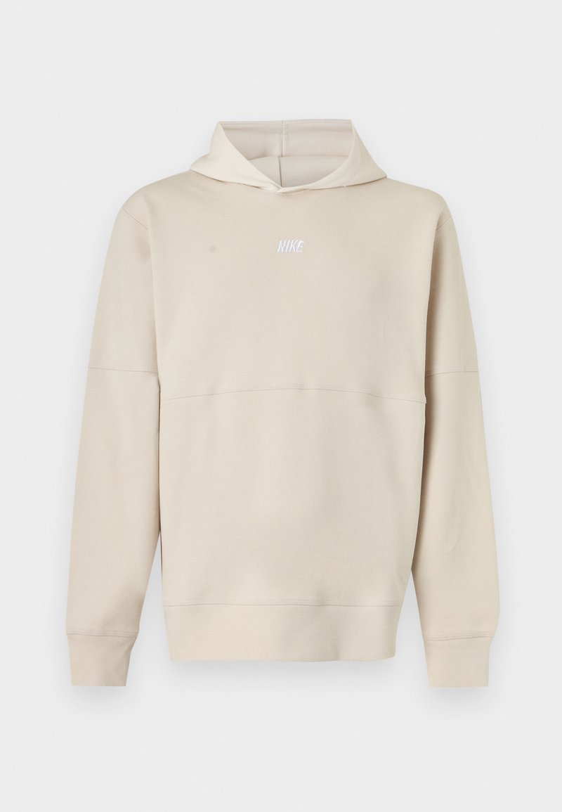 Beige Nike hættetrøje med lange ærmer og frontlogo, med hætte og ribkant ved ærmer og kant.
