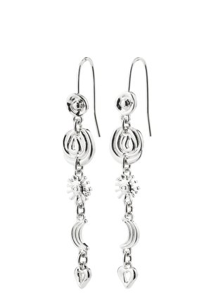 Dangling silver earrings with circular, sun, crescent moon, and heart-shaped charms linked in a vertical chain design.
