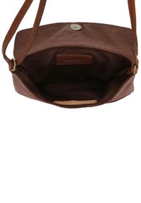 Borsa a tracolla marrone con chiusura a scatto magnetico, in tessuto di cotone e dettagli in pelle. Interno non foderato con etichetta del marchio.