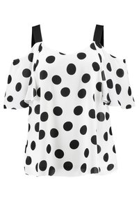 Blusa bianca a spalle scoperte con pois neri, spalline larghe nere, maniche corte a volant e vestibilità ampia.