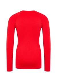 Langärmliges Sportshirt in leuchtendem Rot, mit einer taillierten Passform, glatter Textur und Nahtdetails an den Raglanärmeln.