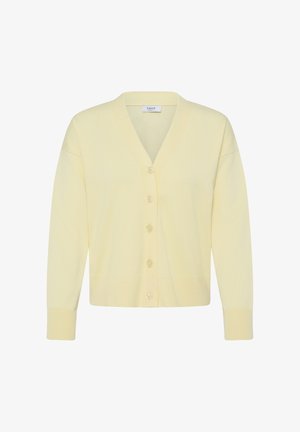 Mehak rumeno gumbasto pleteno jopico z V-izrezom in dolgimi rokavi, ki ima rebraste manšete in spodnji rob.