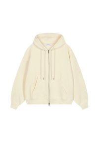 Sudadera cremosa con cremallera, que presenta una capucha amplia, dos bolsillos frontales y detalles de cordón. Textura suave con puños y dobladillo acanalados.