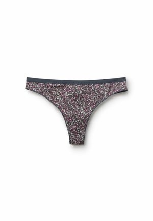 String taille basse pour femme avec petit imprimé floral rose et blanc sur fond foncé et ceinture foncée.