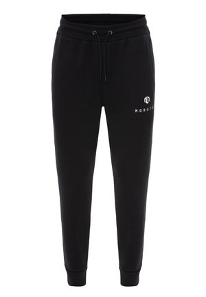 Sorte sweatpants lavet af blødt stof, med elastisk talje og snørebånd, tætsiddende ben og et hvidt logo på venstre side.