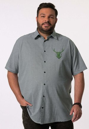Camicia a maniche corte con bottoni, in un motivo a quadri verde e nero, con un logo a forma di cervo verde sul lato sinistro del petto. Realizzata in tessuto leggero.