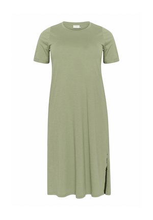 Světle zelené šaty ke kolenům vyrobené z měkké tkaniny, s krátkými rukávy, kulatým výstřihem a bočním rozparkem pro zvýraznění detailu.