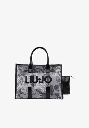 Borsa tote trasparente con stampa floreale nera e manici neri, con un grande logo LIU·JO sul davanti e una piccola pochette nera accanto.