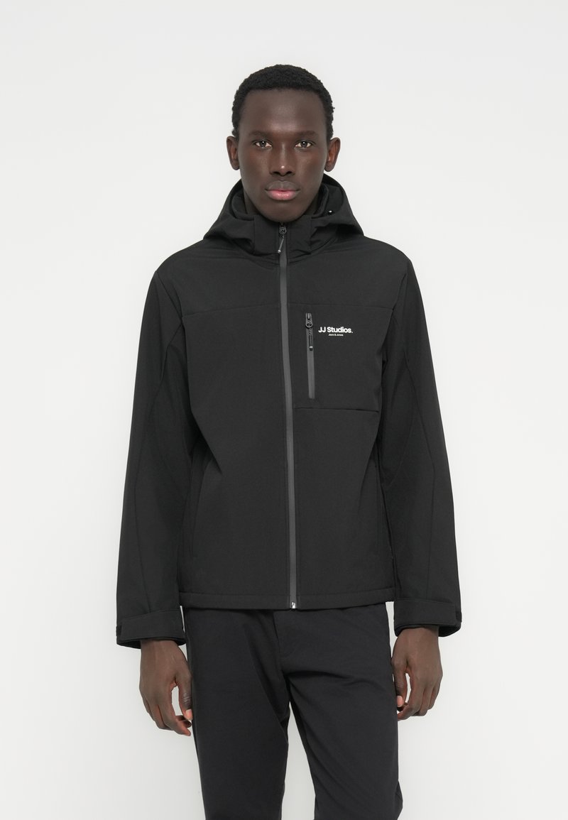 Black waterproof jacket with a hood, front zip, and chest pocket. Features sleek, smooth texture and a minimalist design.