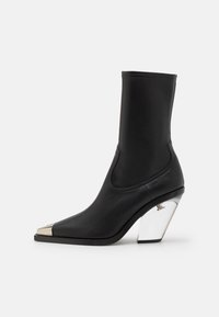 Botines camperos - black