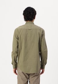 Tommy Jeans WASHED SHIRT - Shirt - fatigue green