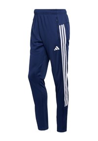 Σκούρες μπλε φόρμες φτιαγμένες από ελαφρύ ύφασμα με λευκή τριπλή ρίγα στο πλάι και ελαστική μέση, με τσέπη με φερμουάρ.