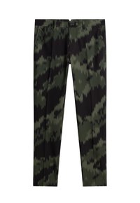 Byxor i grön och svart ikatmönster, med en standard midja och sidfickor. Tillverkade av ett mjukt och lätt tyg.