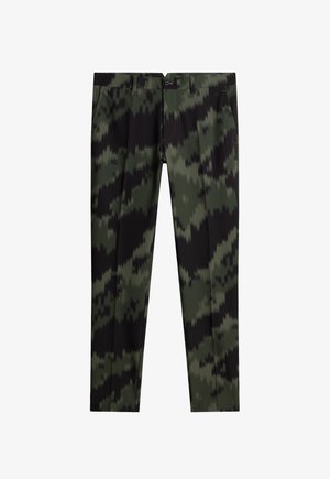 Broek in groen en zwart ikatpatroon, met een standaard tailleband en zijzakken. Gemaakt van soepele, lichte stof.