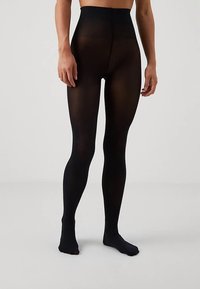 Melnas necaurspīdīgas zeķubikses ar augstu jostasvietu, gludu faktūru un pieguļošu dizainu, kas sedz kājas līdz potītēm.