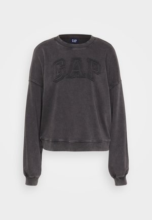Sweatshirt cropped cinza-escuro com decote canelado e mangas longas. Apresenta o logótipo GAP em relevo na frente. Textura suave, design minimalista.