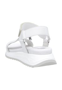 Sandales blanches avec des sangles ajustables, tige en cuir texturé, semelle intérieure rembourrée et semelle en caoutchouc légère dotée d'un motif de semelle.