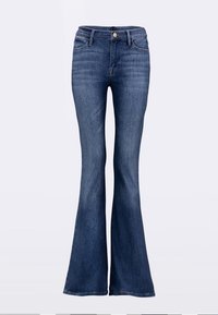 Sötétkék trapéz farmernadrág, denimből készült, magasított derékrésszel, öt zsebbel és kontrasztos varrással a részletek kiemelésére.