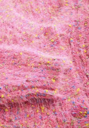 Textured pink fabric with multicolored specks in yellow, blue, and green. The material has a fuzzy, soft appearance.