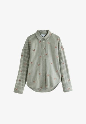 Zelena srajca s črtami in gumbi, okrašena z vezenimi živalmi, ima ovratnik, dolge rokave in zaobljen rob. Mehka tkanina.