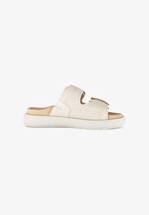 Beige slip-on sandal with woven leather upper, cushioned footbed, thick white sole, and gold buckle detail on top.