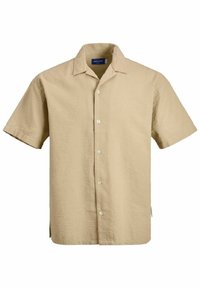 Chemise beige à manches courtes texturée avec col, cinq boutons visibles et fentes latérales.