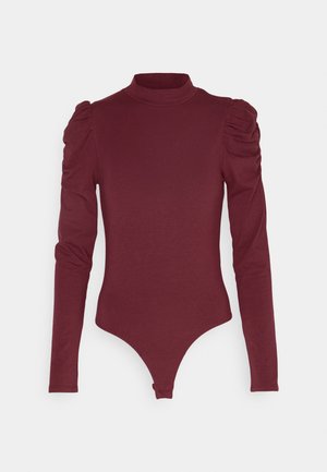 Bordo garais piedurkņu bodijs ar augstu apkakli un saplacinātām pūkainām piedurknēm. Izgatavots no mīksta auduma, ar pieguļošu siluetu un tanga apakšdaļu.