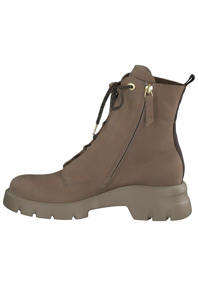 Bottes courtes en cuir beige avec un bout arrondi, fermeture à lacets sur le devant et un détail de fermeture éclair latérale. Présentent une semelle épaisse en caoutchouc texturé.