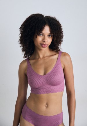 Mauve bralette and brief set with a textured pattern. Wide straps, V-neckline, and scalloped edges, made from a soft, stretchy material.