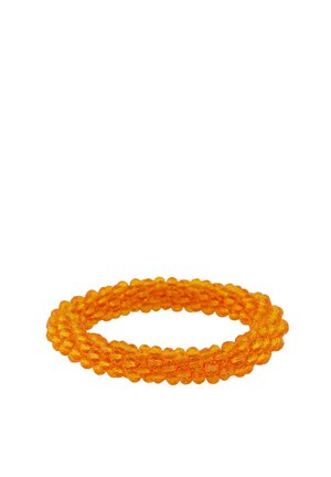 Coiled bracelet made of multiple strands of small, translucent orange beads with a faceted surface.