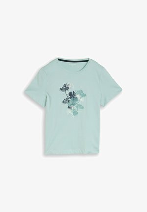 Jasnoniebieski t-shirt z krótkim rękawem i okrągłym dekoltem, z centralnym nadrukiem botanicznym przedstawiającym warstwowe liście miłorzębu w odcieniach niebieskiego i białego.