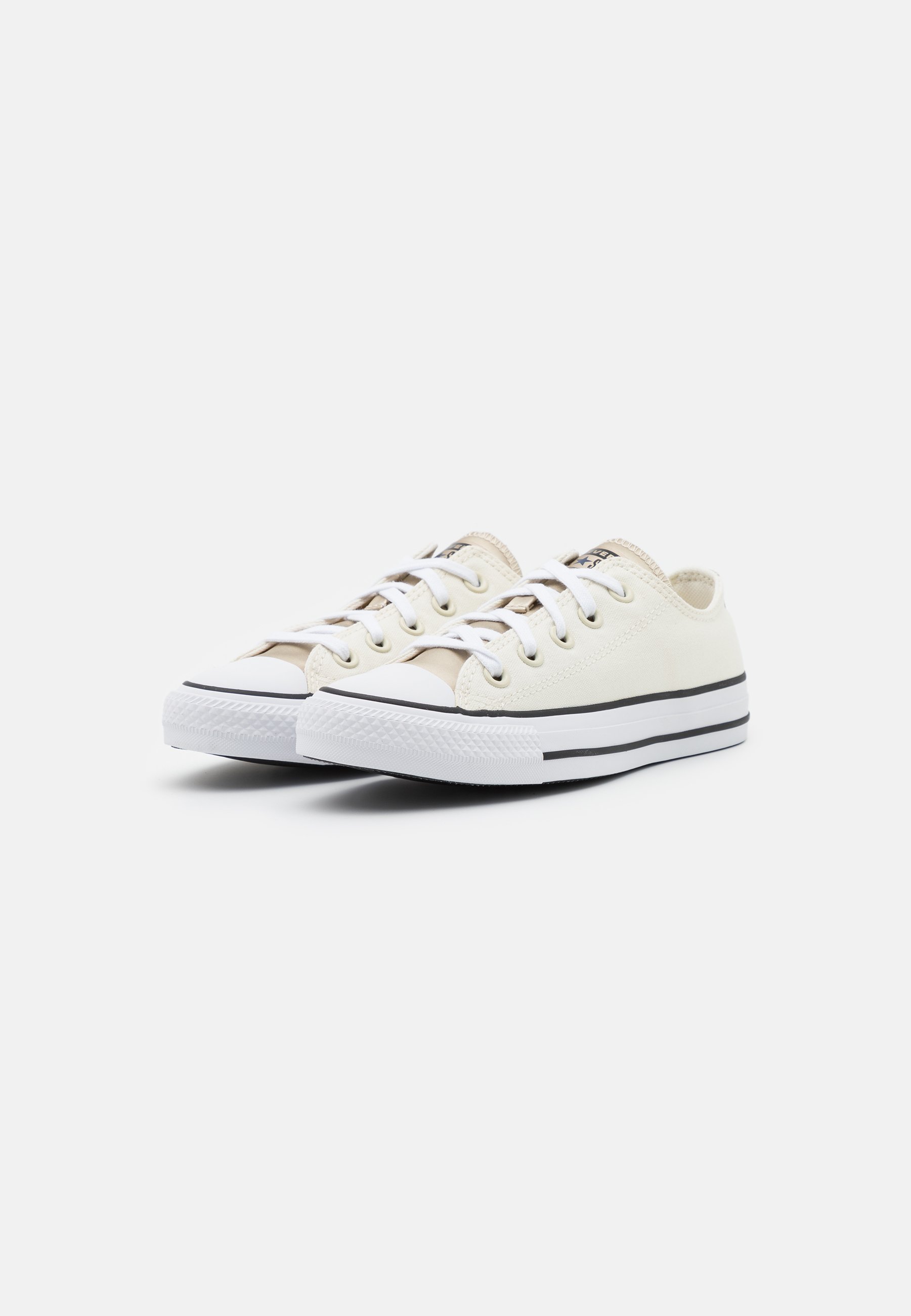 white and gold star converse